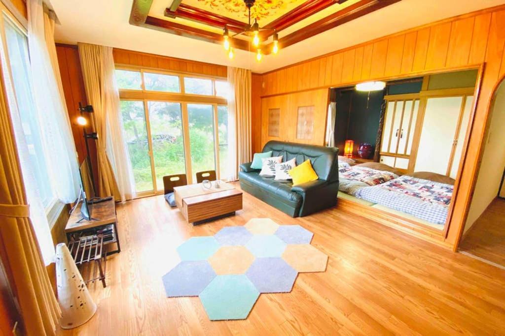 Manyi'S Onsen House 天然温泉マンイの湯 Villa Shiraoi Bagian luar foto