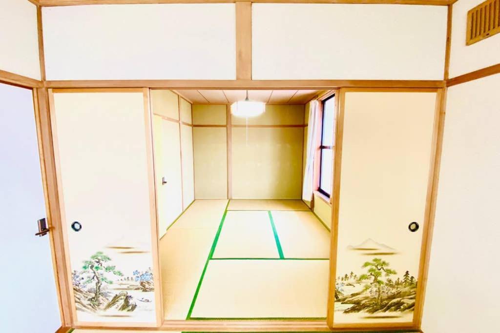 Manyi'S Onsen House 天然温泉マンイの湯 Villa Shiraoi Bagian luar foto