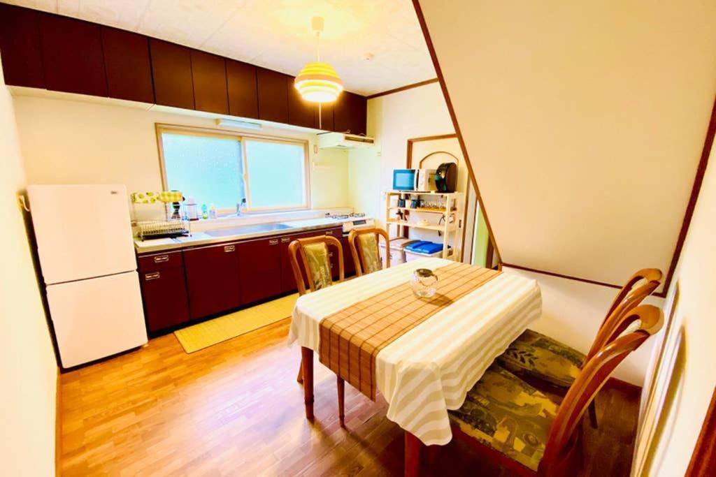 Manyi'S Onsen House 天然温泉マンイの湯 Villa Shiraoi Bagian luar foto