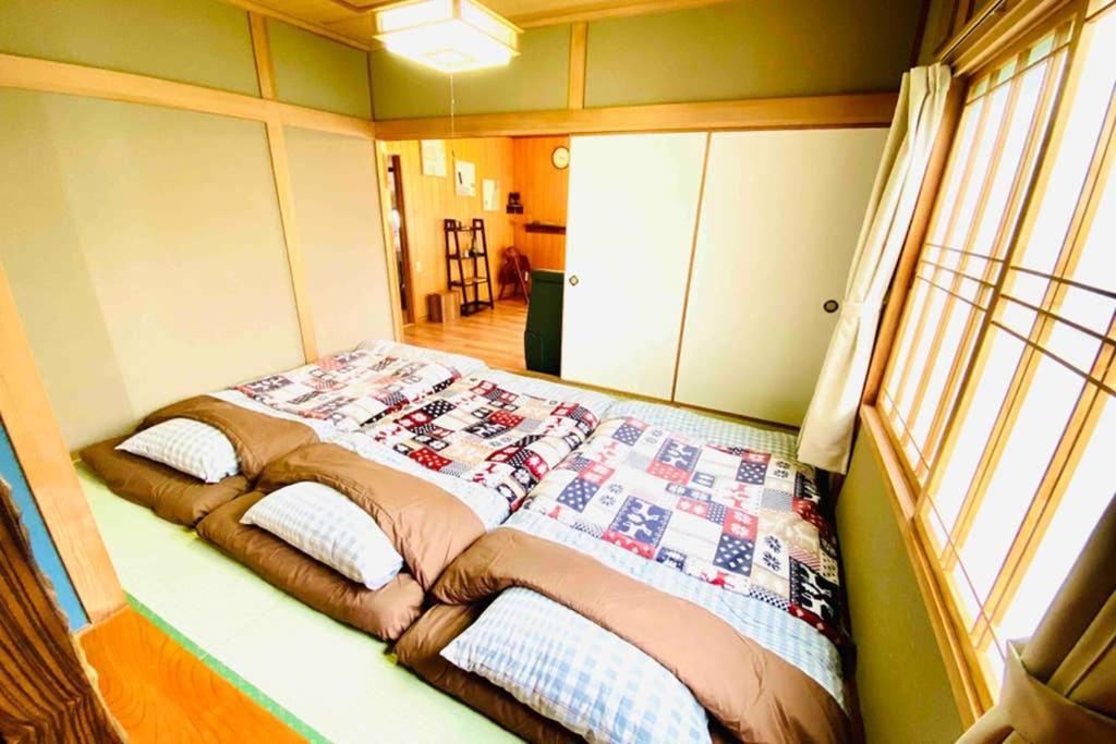 Manyi'S Onsen House 天然温泉マンイの湯 Villa Shiraoi Bagian luar foto